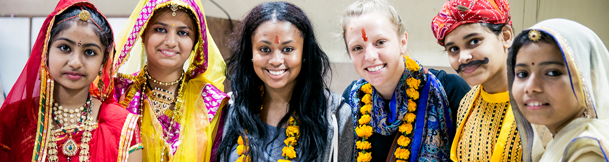 FSU exchange student with costumed group of Indian females